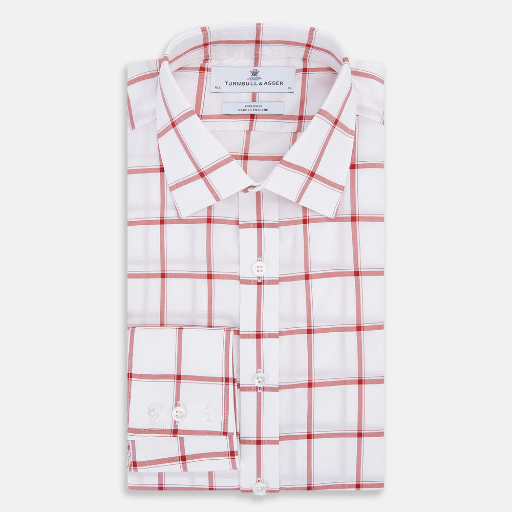 The Turnbull & Asser Dark Red Grid Check Mayfair Shirt is a long-sleeve white shirt made from Italian cotton, featuring a bold dark red grid pattern, button-down front, and classic collar, shown laid flat on a white background.