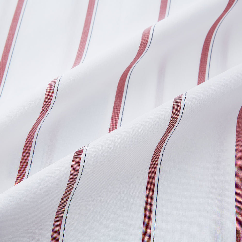 The Turnbull & Asser Dark Red Track Stripe Mayfair Shirt is crafted from Italian cotton, featuring a pointed collar and buttoned cuffs. Displayed against a plain light background.