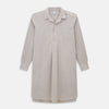 View 1 of product The Turnbull & Asser Brown Micro Check Quarzo Nightshirt is a long-sleeve shirt dress inspired by classic sleepwear, featuring a collar, chest pocket, upper front buttons, and a subtle micro check pattern on a white background.