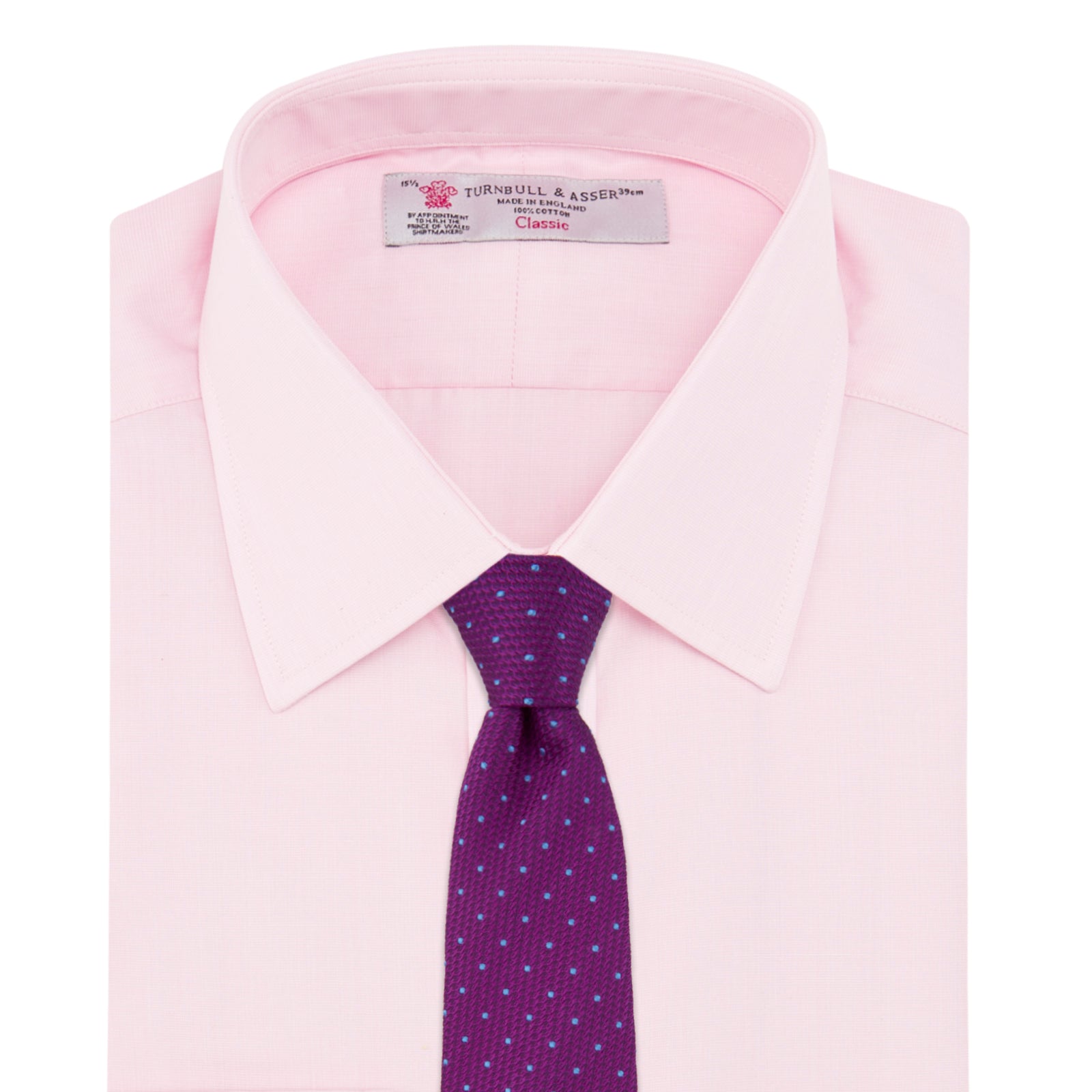 View 4 of product The Pink End-on-End Shirt with T&A Collar and Double Cuffs by Turnbull & Asser, shown neatly folded on a white background, updates timeless elegance with its classic detailing and refined pink hue.