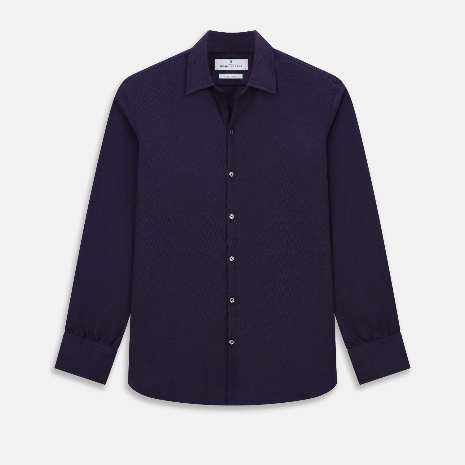 View 1 of product The Navy Textured Windsor Shirt by Turnbull & Asser features long sleeves, a Windsor collar, buttoned cuffs, and white buttons—a fine example of British craftsmanship—set against a plain white background.