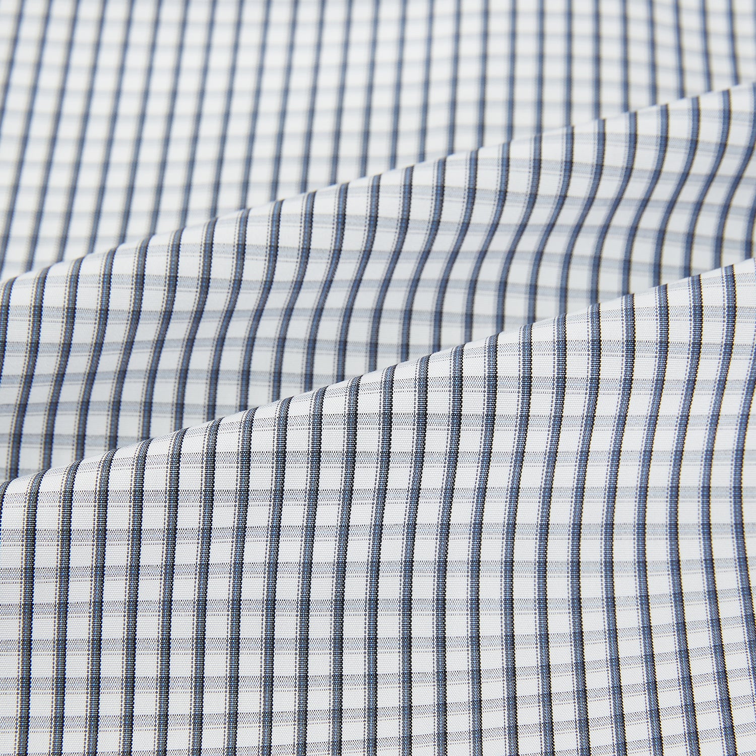 View 6 of product The Grey Double Graph Mayfair Shirt by Turnbull & Asser is a long-sleeve, button-down cotton shirt with a black and white double graph check, chest pocket, and classic collar.