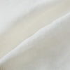 View 5 of product The Vanilla Linen Holland Shacket by Turnbull & Asser, a white Irish linen button-up with a collar, brown buttons, and four pockets, is laid flat on a white background—perfect as lightweight outerwear.