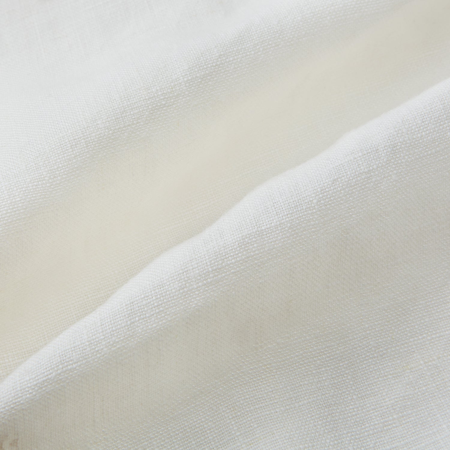 View 5 of product The Vanilla Linen Holland Shacket by Turnbull & Asser, a white Irish linen button-up with a collar, brown buttons, and four pockets, is laid flat on a white background—perfect as lightweight outerwear.
