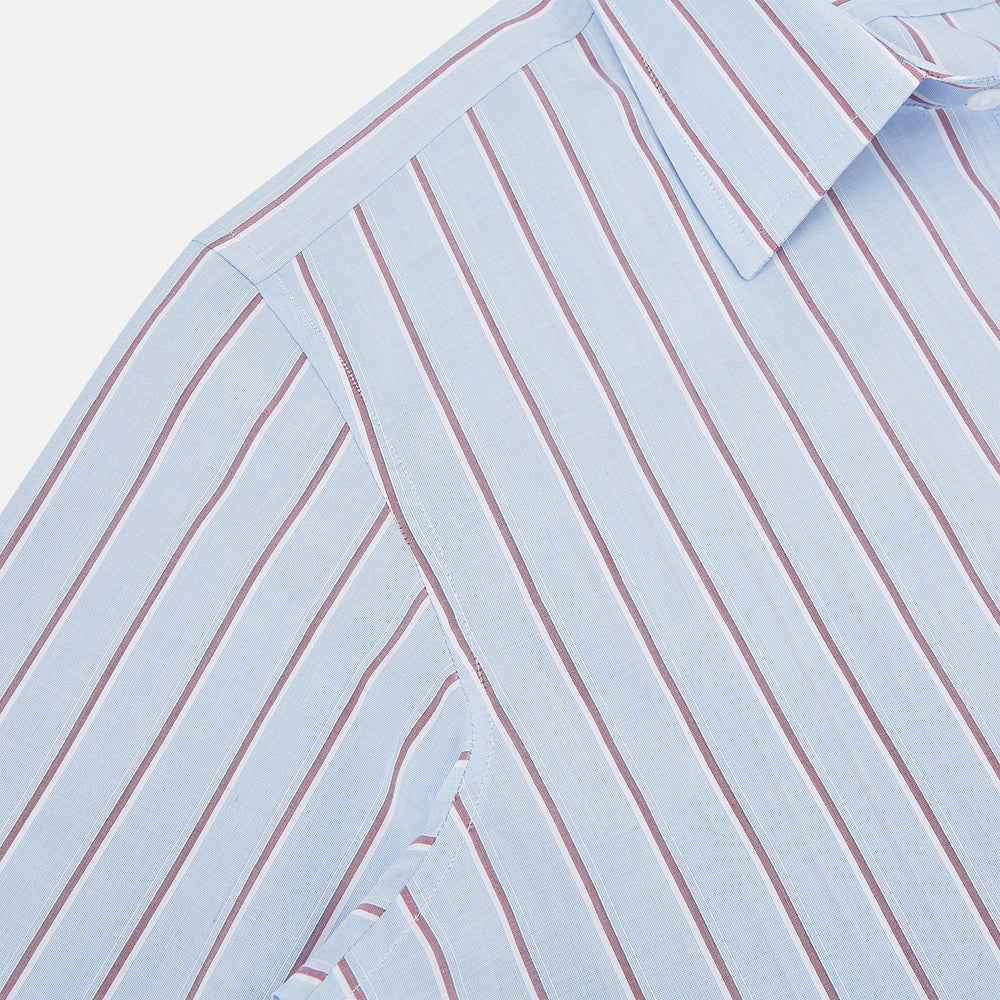 The Turnbull & Asser Blue and Burgundy Multi-Stripe Westminster Shirt features a pointed collar and long sleeves, laid flat on a white background to highlight its fine British craftsmanship.