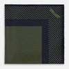 View 3 of product The Turnbull & Asser Navy and Yellow Dot Silk Pocket Square features a navy base with yellow dots, a solid navy border, and a folded corner showing the patterned underside for an elegant accent.