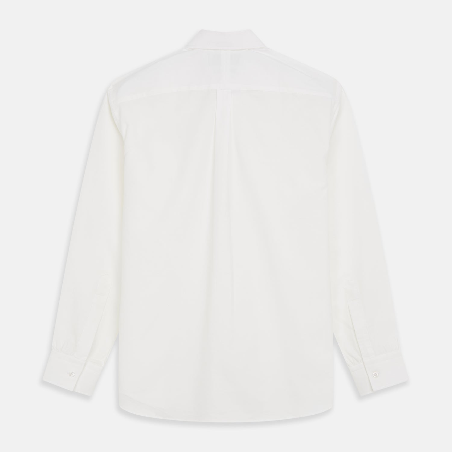 View 5 of product The White Cotton Weekend Fit Langston Shirt by Turnbull & Asser, with a Derby collar, long sleeves, and two button-flap chest pockets, is shown laid flat on a white background.
