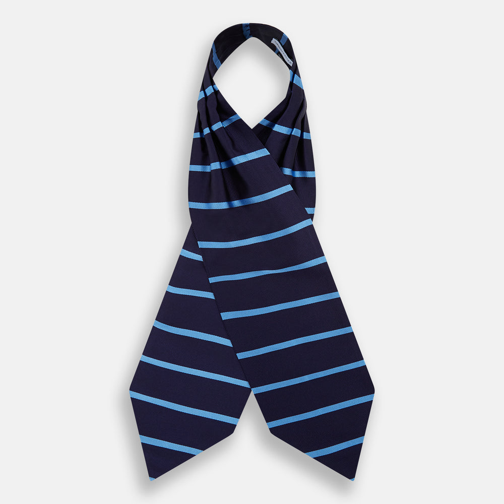 The Turnbull & Asser Azzurro Stripe and Navy Silk Cravat is elegantly displayed against a white background, featuring two horizontal light blue stripes and a bottom edge forming a downward-pointing triangle.
