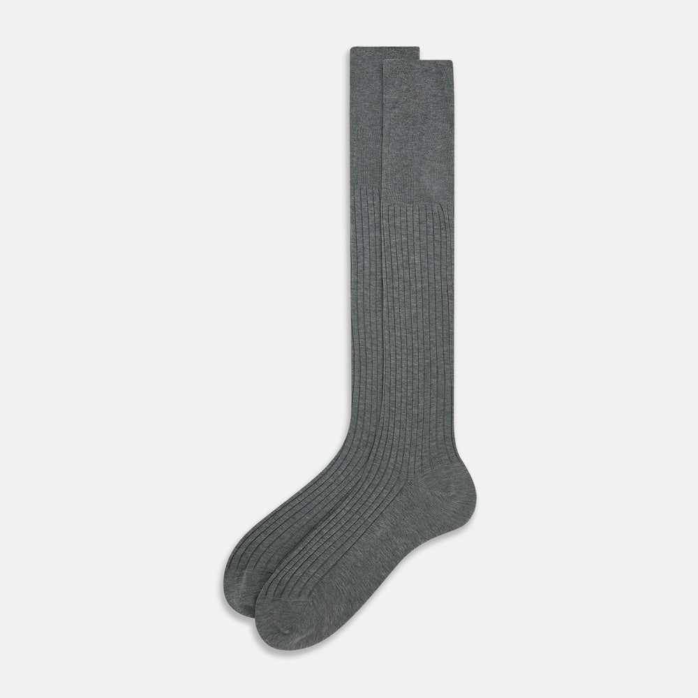 The Ash Long Sock by Turnbull & Asser is a single, knee-high sock in dark gray Egyptian cotton with a ribbed texture, displayed upright against a plain white background.