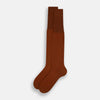 View 2 of product The Rust Motif Long Sock by Turnbull & Asser, featuring a subtle diamond pattern and crafted from mercerised Egyptian cotton, is shown individually against a plain white background.