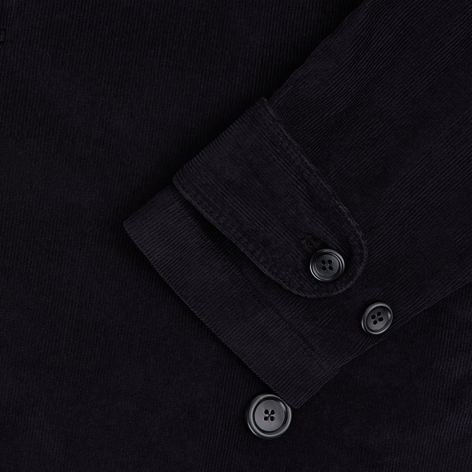 Image 5 of product The Navy Kingston Corduroy Caban Jacket by Turnbull & Asser features six front buttons, a notched collar, chest pocket, and buttoned cuffs, showcased against a plain white background.