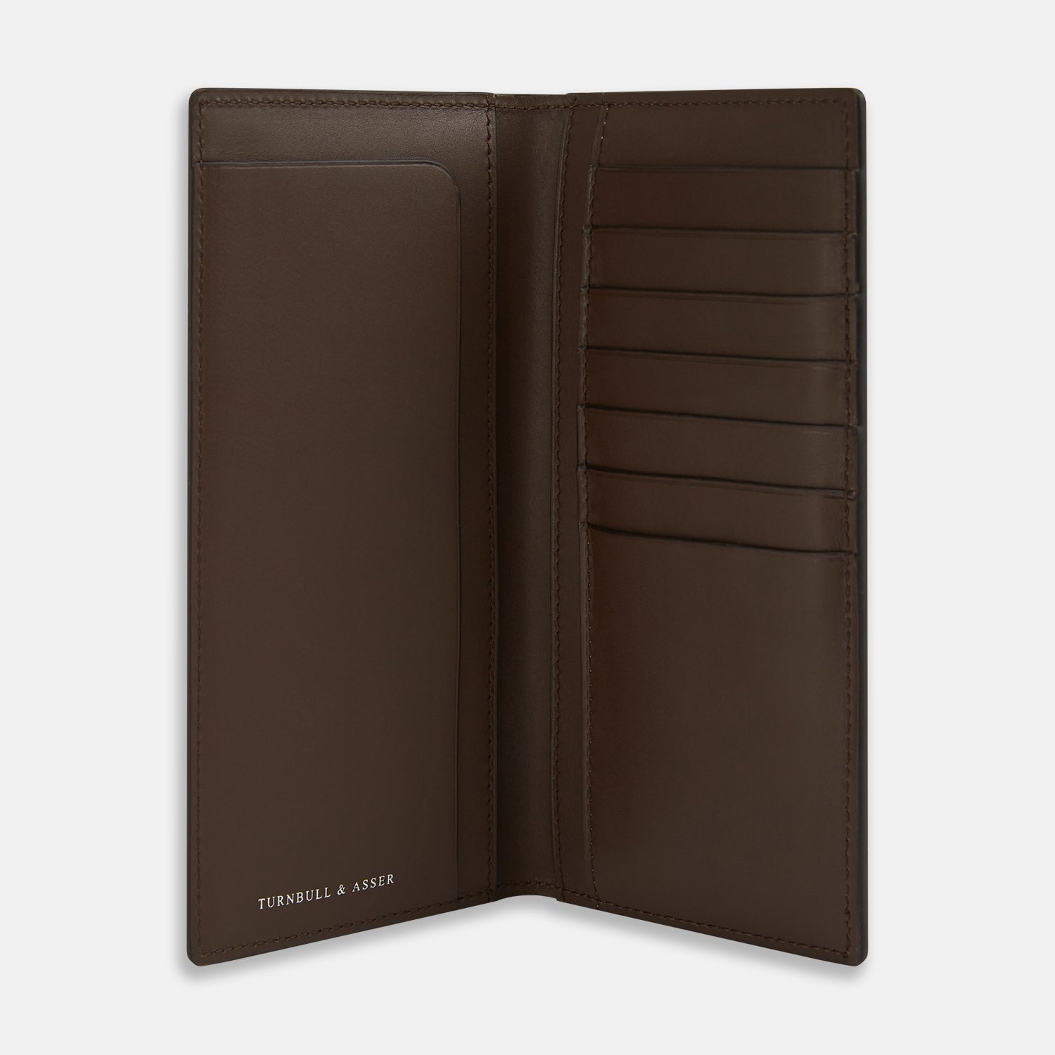 View 2 of product The Turnbull & Asser Dark Chocolate B Cut Continental Wallet features a simple rectangular design in rich brown Italian leather with clean edges and minimal stitching, shown closed on a plain white background.