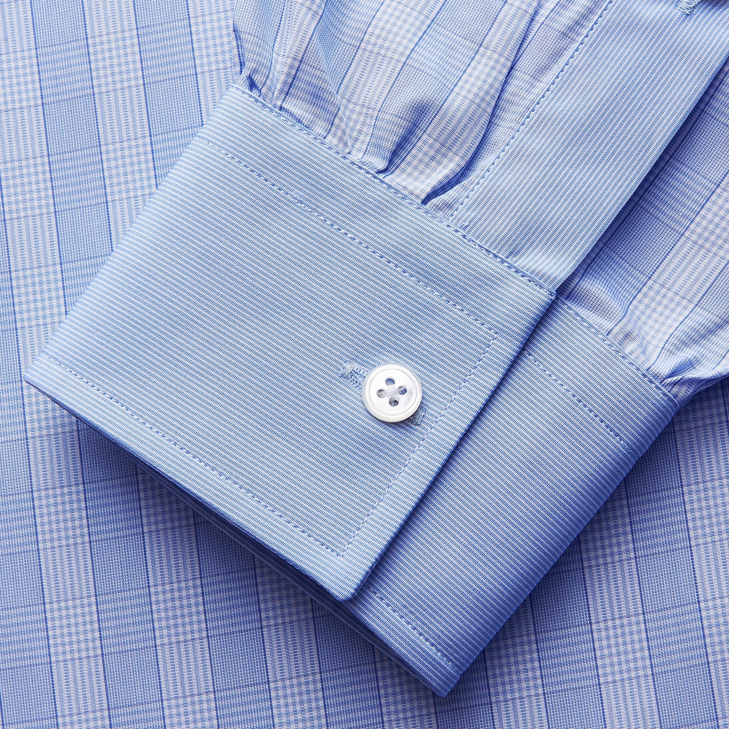 View 2 of product Turnbull & Asser's Blue Multi Check Cotton RE-PURPOSE Weekend Fit Suffolk Shirt, crafted from recycled fabrics, features a multi-check pattern, button-down collar, and chest pocket, and is displayed flat on a white background.
