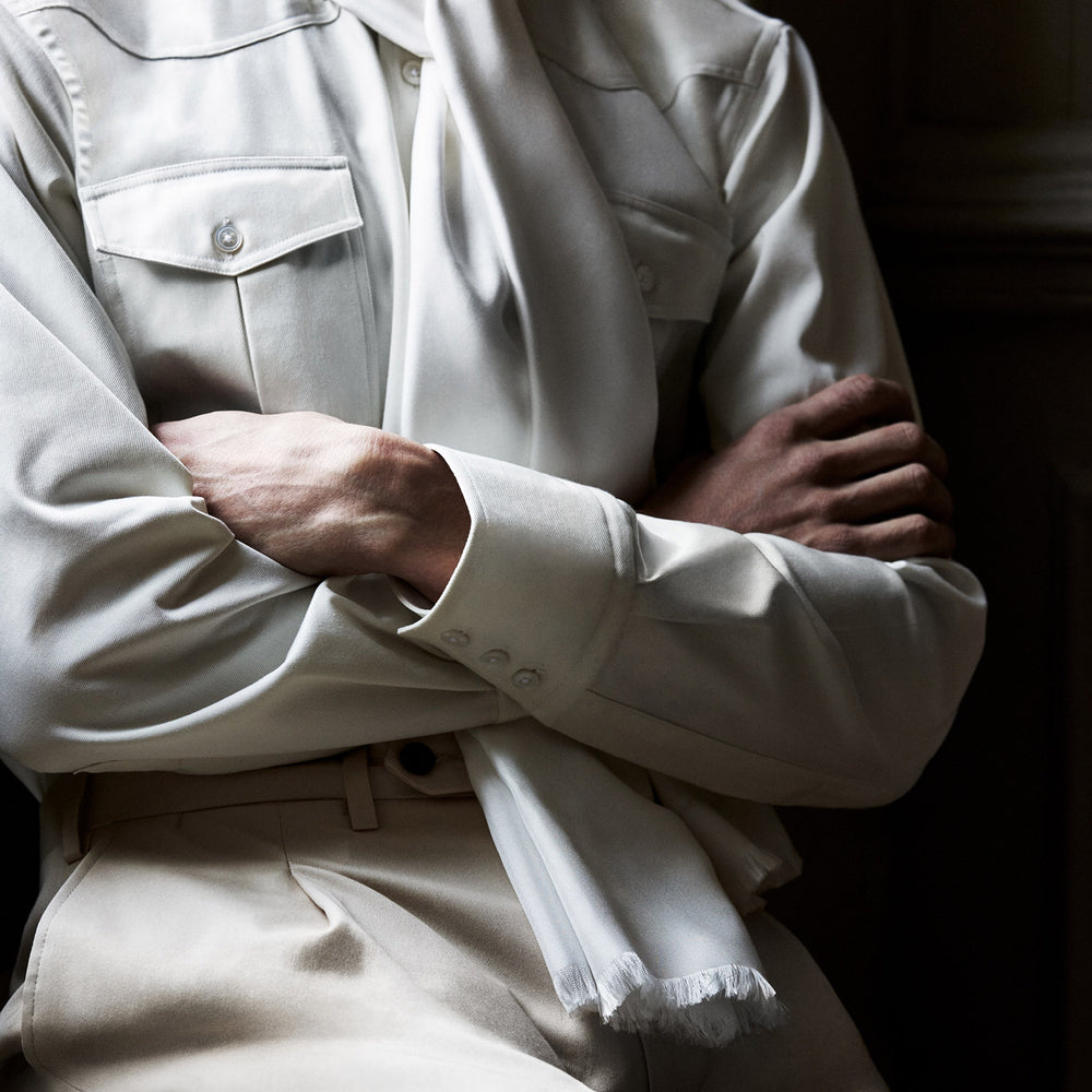 The Cream Cotton Weekend Fit Western Shirt with Dorset Collar by Turnbull & Asser features two chest pockets and is laid flat on a white background—ideal for smart-casual style.