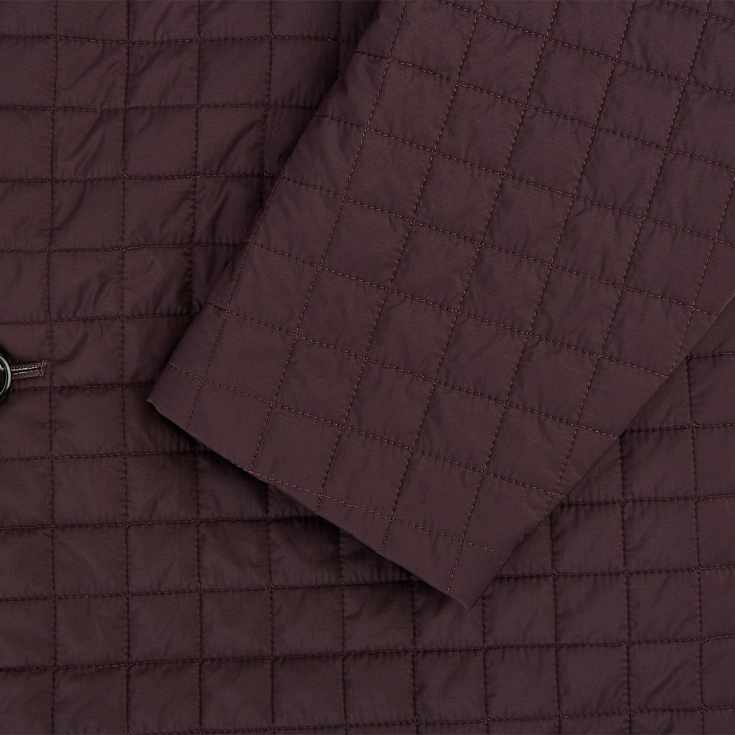 Image 4 of product The Fulham Burgundy Single-Breasted Quilted Blazer by Turnbull & Asser features a grid pattern, notch lapel, three buttons, and three front pockets. Shown on a plain white background—ideal for the modern gentleman.