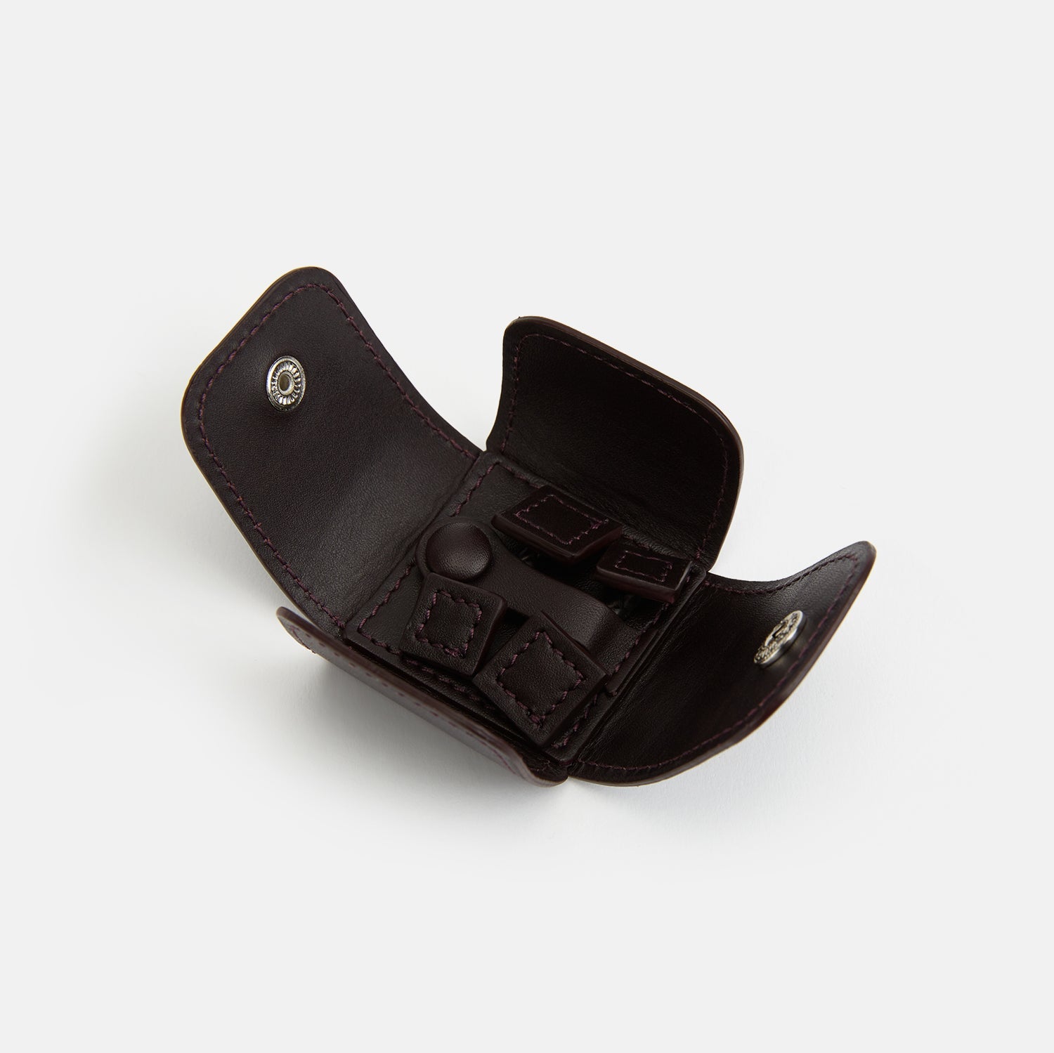 View 2 of product The Burgundy Leather Cufflinks by Turnbull & Asser feature square Italian leather with visible edge stitching and braided loops, presented on a white background—an elegant addition to men's accessories.