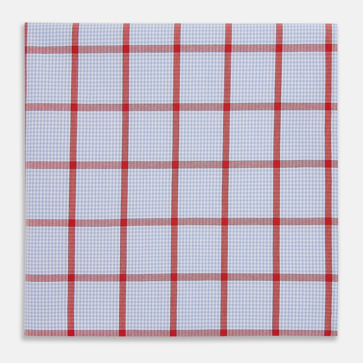 View 1 of product The Turnbull & Asser Hand Rolled Red Windowpane Check Handkerchief features a light blue and white gingham base with red checks—perfect as a gentleman's pocket square for a refined, classic touch.