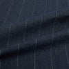 View 8 of product The Turnbull & Asser Navy Melange Wide Stripe Westminster Shirt features a classic collar, buttoned cuffs, and a tailored fit, showcasing British craftsmanship. Laid flat on a white background.