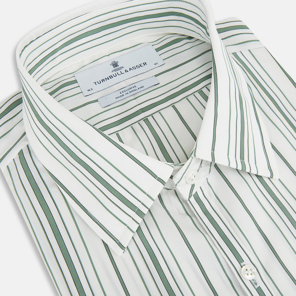 The SAGE GREEN MULTI STRIPE WESTMINSTER SHIRT by Turnbull & Asser features a classic collar, long sleeves, buttoned cuffs, relaxed fit, and vertical green and white stripes—embodying timeless British craftsmanship.