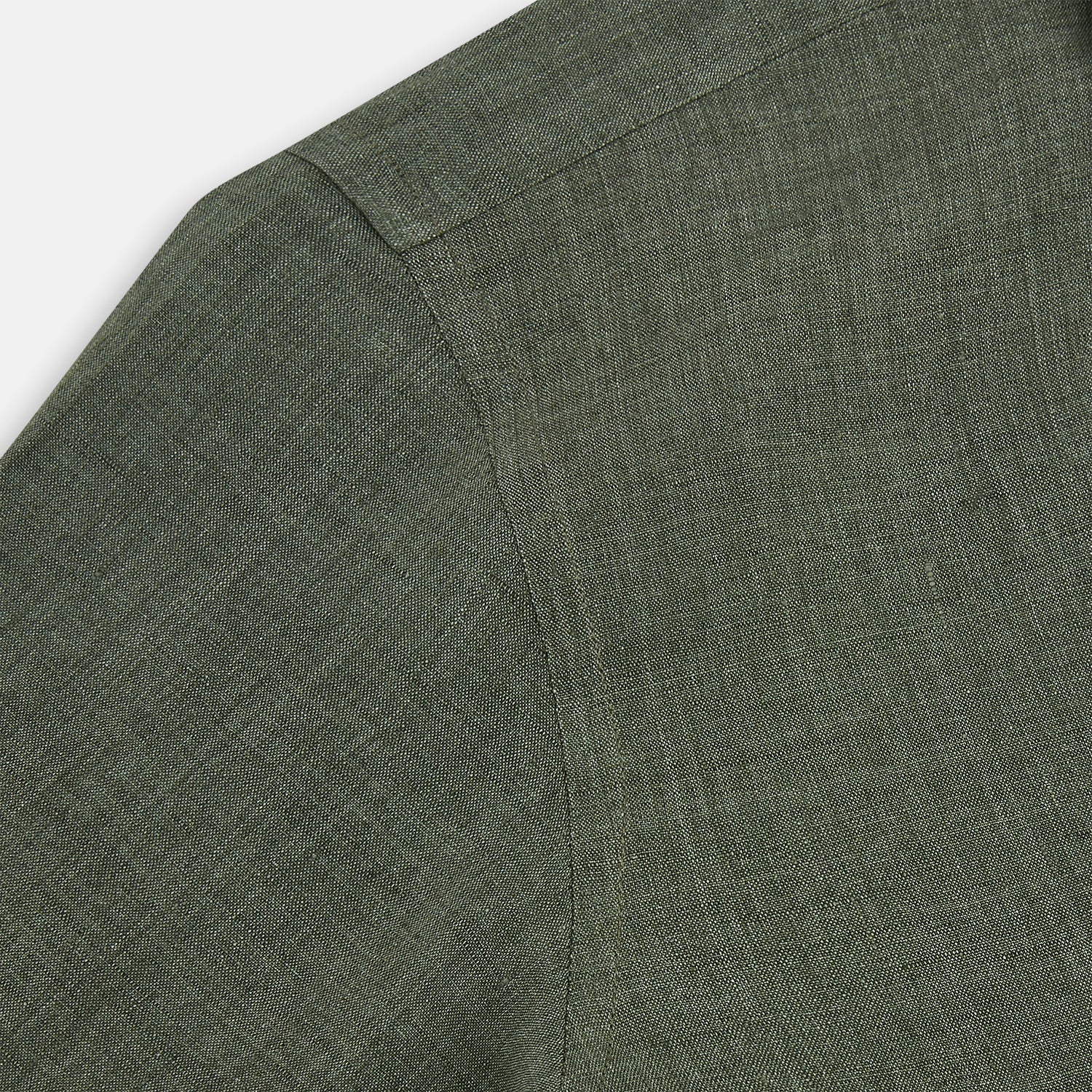 View 6 of product The Sage Linen Westminster Shirt by Turnbull & Asser features long sleeves, a button-up front with white buttons, a pointed Turnbull collar, and buttoned cuffs—crafted in Britain and shown here against a plain white background.