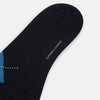 View 3 of product A single Turnbull & Asser Navy/Blue Wool Check Mid-Length Sock, featuring a blue and light blue check pattern, is displayed upright on a plain white background.