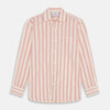 View 2 of product Close-up of Turnbull & Asser's Red and Off-White Stripe Cotton Fabric, featuring diagonal stripes in red and orange on an off-white background, displayed within a circular gray border.