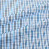 View 6 of product The Sky Blue Micro Graph Check Mayfair Shirt by Turnbull & Asser features a classic T&A collar, button-down front, and buttoned cuffs, shown laid flat on a white background.