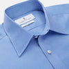 View 2 of product The World Is Not Enough Blue Cotton Istanbul Shirt by Turnbull & Asser, as seen on James Bond, features long sleeves, white buttons, a classic collar, and buttoned cuffs, shown against a plain white background.
