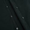 View 7 of product The FOREST GREEN WINDSOR SHIRT by Turnbull & Asser features long sleeves, a Windsor collar, and buttoned cuffs, reflecting British craftsmanship. Displayed on a plain white background.