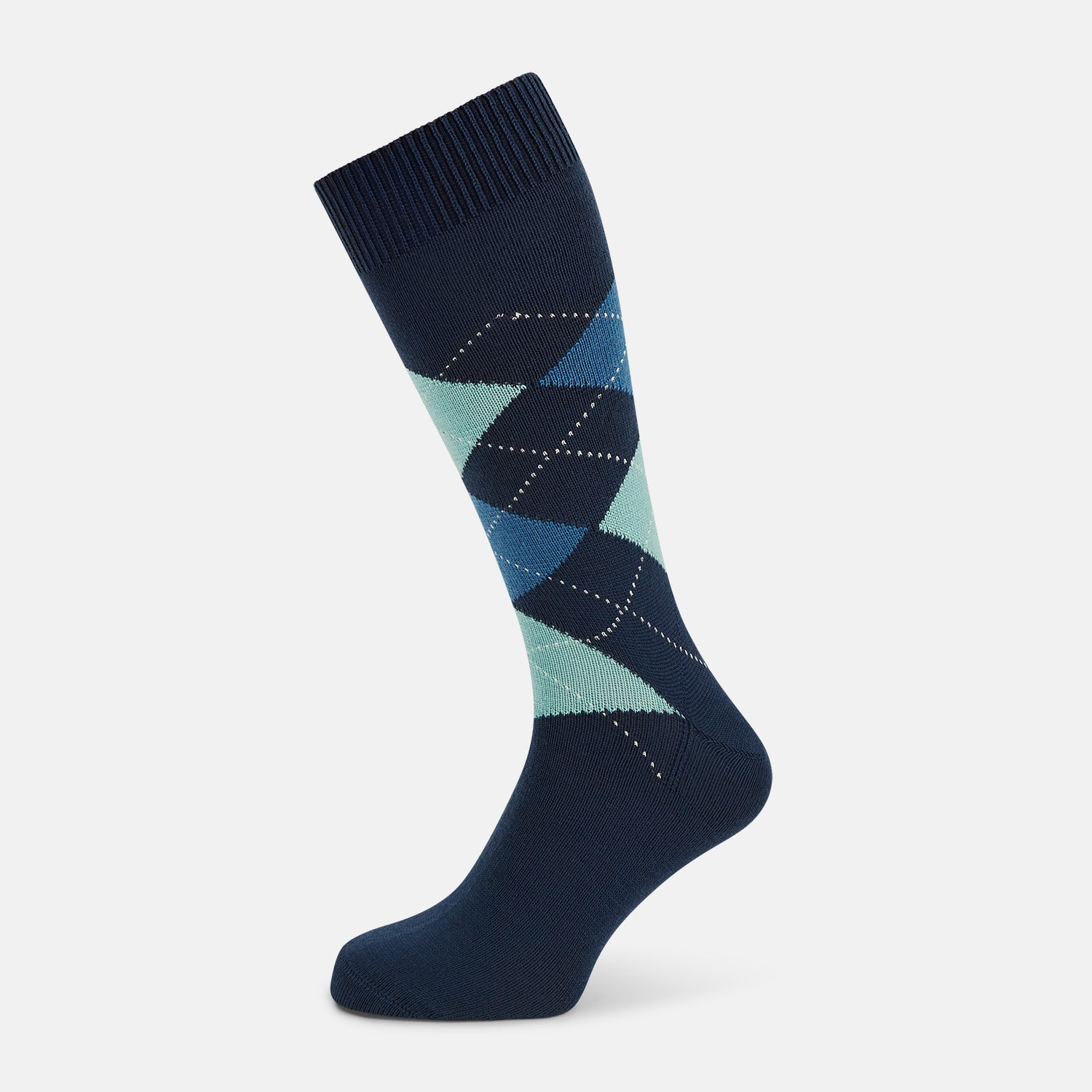 View 1 of product The Azzurro Wool Check Mid-Length Socks by Turnbull & Asser are navy blue with a ribbed cuff, featuring an argyle pattern in light blue, teal, and navy with white accents. Displayed upright against a plain white background.