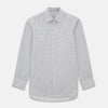 View 1 of product The Turnbull & Asser Sky Blue Multi Graph Check Shirt features long sleeves, a button-up front, pointed T&A collar, buttoned cuffs, and a small blue-and-white check pattern, shown on a white background.