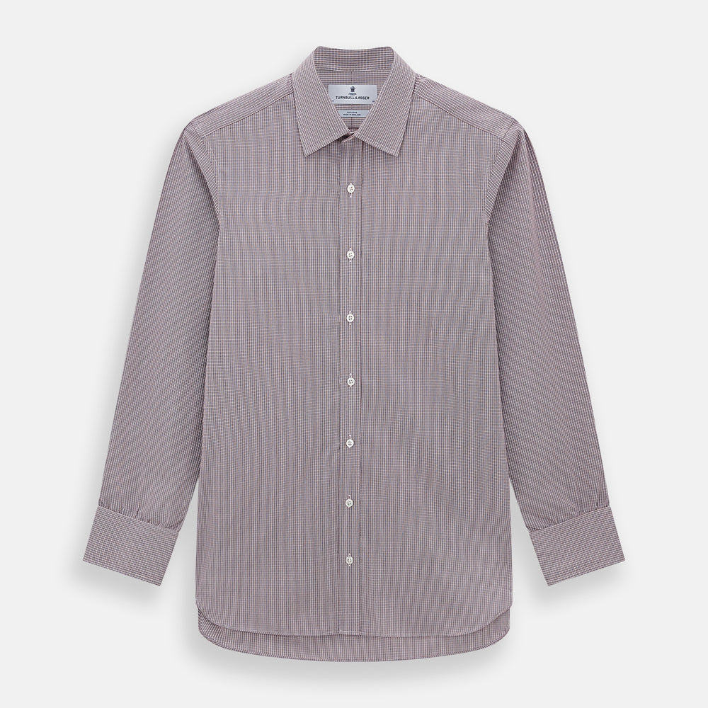 The Turnbull & Asser Burgundy Micro Shadow Check Mayfair Shirt features long sleeves, a classic collar, and white buttons. In light red and white shades, this button-up is perfect for formal wear and is shown laid flat against a white background.