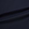 View 8 of product The Navy Westminster Shirt by Turnbull & Asser is a classic long-sleeve, button-up shirt with a pointed collar and buttoned cuffs, exemplifying British craftsmanship, shown against a plain white background.