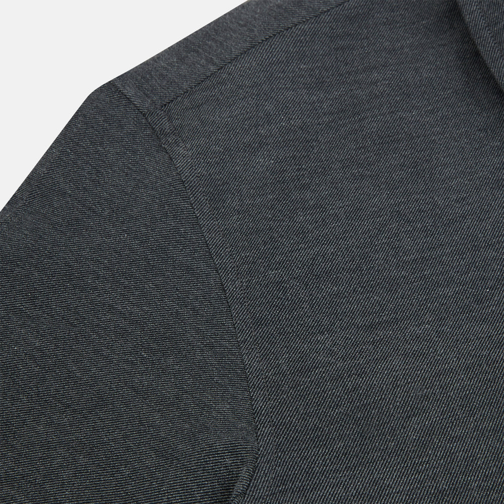 The Charcoal Melange Westminster Shirt by Turnbull & Asser features a long-sleeve, button-up design with a Turnbull collar and buttoned cuffs, offering classic British craftsmanship in a timeless style.