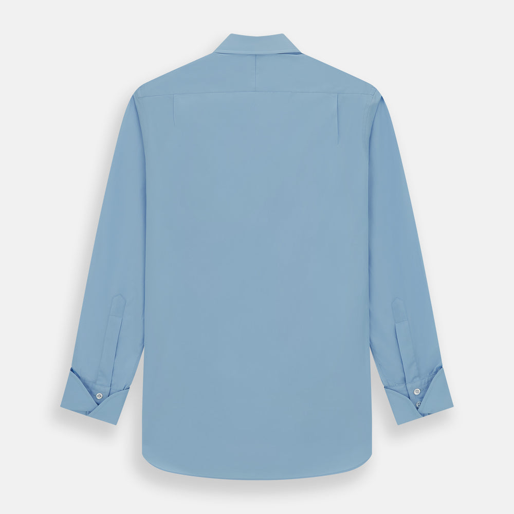 The Turnbull & Asser Dr. No Blue Cotton Shirt with a classic collar, cocktail cuffs, button-up front, and straight hem is featured on a plain white background. As seen on James Bond.