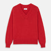 View 1 of product The Turnbull & Asser Raspberry Red Cashmere Edwards V-Neck Sweater features long sleeves, ribbed cuffs and hem, and is shown laid flat on a white background.