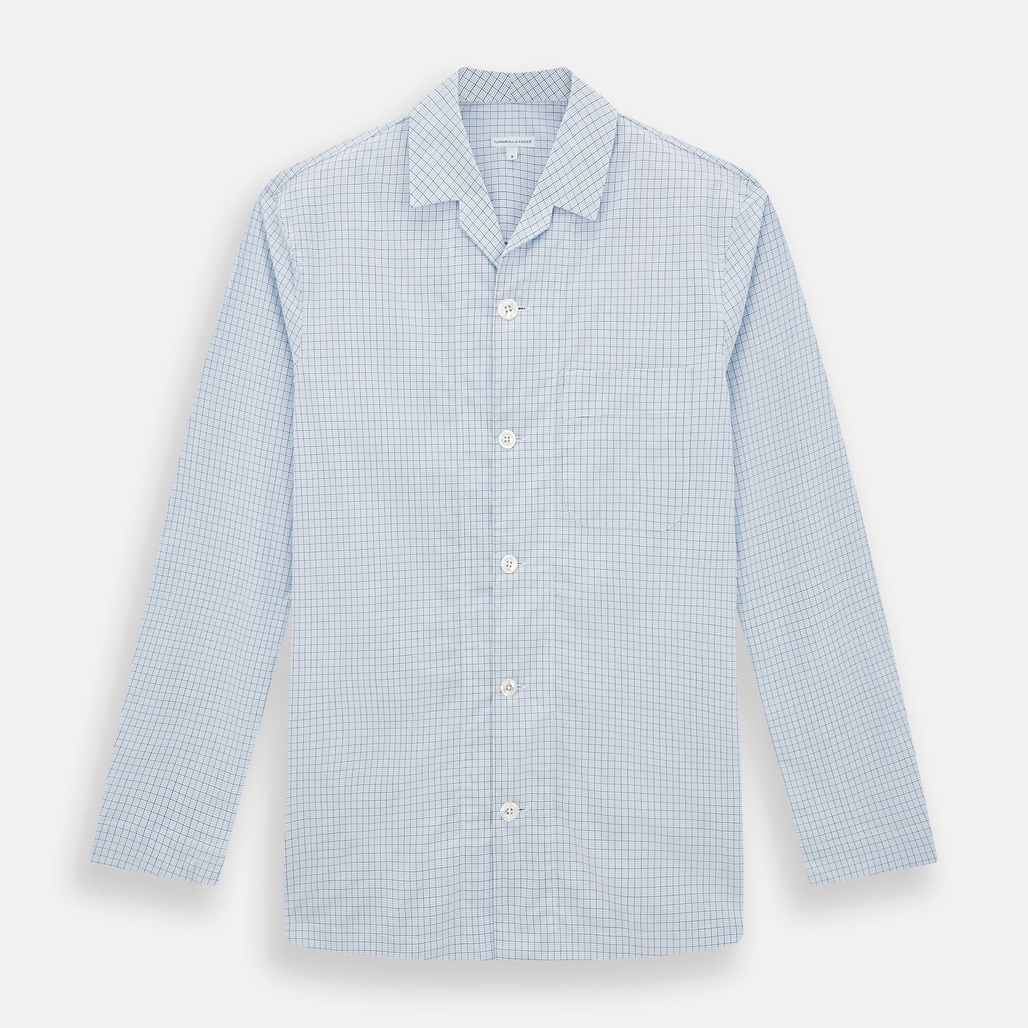 View 1 of product The Turnbull & Asser Blue Graph Check Pyjama Shirt features long sleeves, a collar, and a small check pattern in light blue—ideal as elegant loungewear.