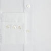 View 4 of product The Turnbull & Asser White Linen Mayfair Shirt features long sleeves and a classic collar, shown on a flat white background.