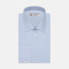 View 2 of product A circular swatch of Turnbull & Asser Light Blue Sea Island Quality Cotton Fabric, subtly textured and bordered by thin gray and white rings, displayed on a plain white background.