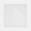 View 1 of product A White Cross Stripe Hand-Rolled Linen Handkerchief by Turnbull & Asser UK, artfully folded with one corner turned down, is displayed on a plain white background, evoking the elegant look of a classic pocket square.
