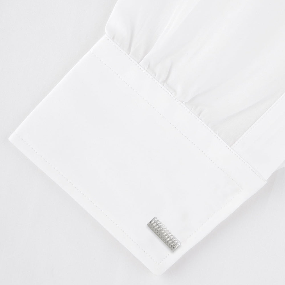 Turnbull & Asser’s Sterling Silver Bar Cufflinks feature a textured cylindrical design and chain links, making them an elegant men’s accessory, shown here on a plain white background.