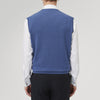 View 3 of product The Turnbull & Asser Blue V-Neck Cashmere Slipover, neatly folded with the label visible, is crafted from soft cashmere and ideal for formal layering. Shown against a white background.