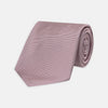 View 1 of product The Turnbull & Asser Rose Horizontal Twill Silk Tie features a pale pink ribbed silk texture, displayed on a white background—ideal for adding a smart touch to cotton shirts.