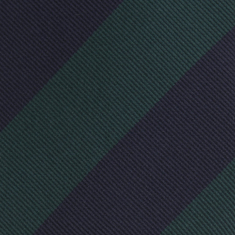 The Turnbull & Asser Navy and Forest Green Block Stripe Repp Silk Tie features bold stripes and is expertly crafted from luxurious silk, shown rolled on a white background.