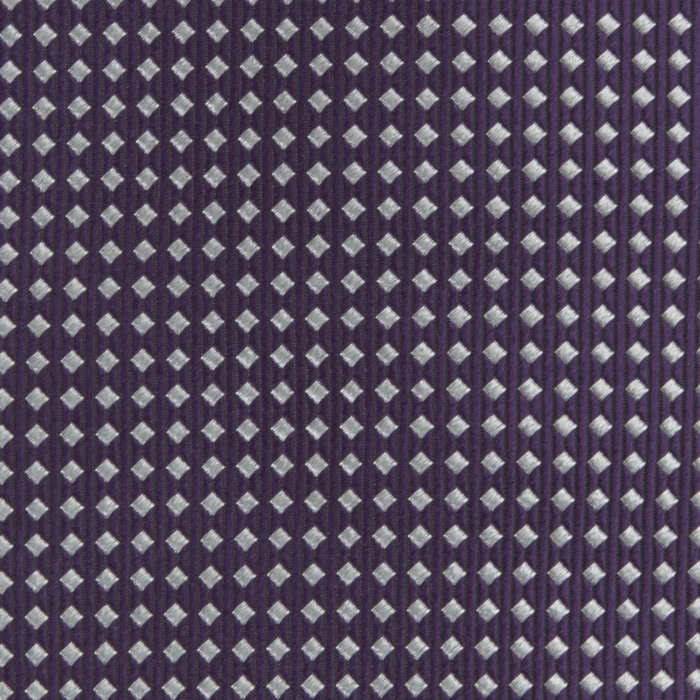 The Turnbull & Asser Plum and White Diamond Silk Tie features a subtle repeating pattern, shown rolled up on a white background—a timeless accessory to elevate any office shirt.