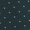 View 3 of product The Forest Green and White Small Spot Herringbone Silk Tie by Turnbull & Asser features a dark green woven herringbone pattern with small white spots, crafted from fine English silk and shown rolled up on a white background.