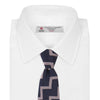 View 2 of product The Turnbull & Asser Navy and Rose Striped Zigzag Silk Tie features a bold zigzag pattern and is shown against a plain white background, making it an ideal accessory for the modern gentleman.