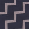 View 3 of product The Turnbull & Asser Navy and Rose Striped Zigzag Silk Tie features a bold zigzag pattern and is shown against a plain white background, making it an ideal accessory for the modern gentleman.