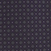View 3 of product The Turnbull & Asser Plum Floral Spot Silk Tie features a rolled-up classic design with small, evenly spaced floral spots in lighter purple and white, ideal for office shirts and shown against a plain white background.