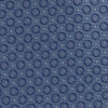 View 3 of product The Light Blue Floral Spot Silk Tie by Turnbull & Asser features a classic pattern in varied blue tones, rolled up on a white background—an ideal accessory to complement any office shirt.